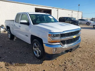 2017 Chevrolet Silverado 1500 LT with VIN 1GCRCREC5HZ210168, listed as a IAAI auction lot 41838729 with 88,880 mi miles and . Bid and sale history available at DreamBid. Image 1.