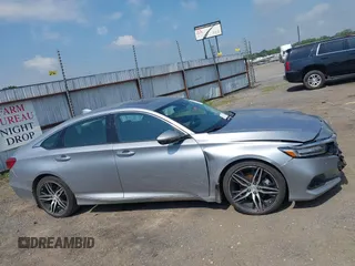 2021 Honda Accord Touring with VIN 1HGCV2F99MA014738, listed as a IAAI auction lot 42392129 with 25,802 mi miles and . Bid and sale history available at DreamBid. Image 13.