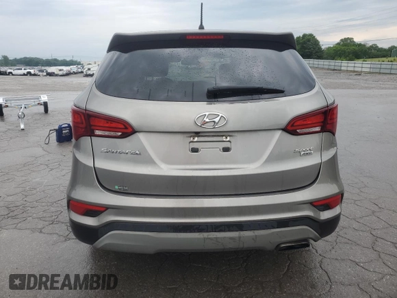 2018 Hyundai Santa Fe 2.4L z VIN 5NMZTDLB7JH098559, wystawiony jako Copart lot #56868005 z przebiegiem 197 233 mil mil oraz Czysty tytuł • Clean title. Historia ofert i sprzedaży dostępna na DreamBid. Obrazek 6.