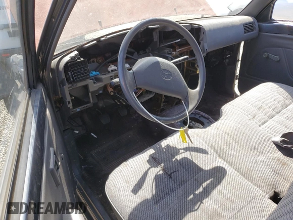 1993 Toyota Pickup z VIN 4TARN81A8PZ090398, wystawiony jako Copart lot #50452745 z przebiegiem Nie podano mil oraz Szkoda całkowita • Salvage title. Historia ofert i sprzedaży dostępna na DreamBid. Obrazek 8.