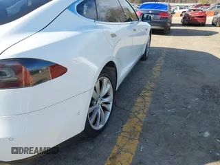 2014 Tesla Model S 60 with VIN 5YJSA1H13EFP62451, listed as a IAAI auction lot 41639068 with 88,000 mi miles and . Bid and sale history available at DreamBid. Image 19.