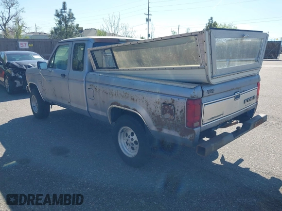 1987 Ford Ranger with VIN 1FTCR15T5HPB40124, listed as a IAAI auction lot 42177557 with 7,957 mi miles. Bid and sale history available at carsss.com. Image 3.