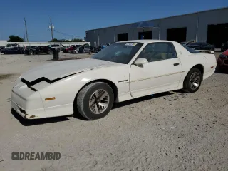 1989 Pontiac Firebird z VIN 1G2FS21S4KL260438, wystawiony jako Copart lot #57420155 z przebiegiem 132 101 mil mil oraz Czysty tytuł • Clean title. Historia ofert i sprzedaży dostępna na DreamBid. Obrazek 2.