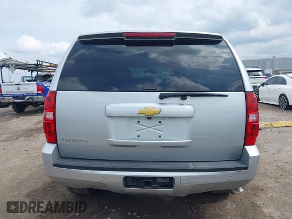 2013 Chevrolet Tahoe LT with VIN 1GNSCBE09DR357304, listed as a IAAI auction lot 42361887 with 96,229 mi miles and . Bid and sale history available at DreamBid. Image 17.