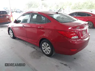 2015 Hyundai Accent GLS with VIN KMHCT4AE2FU888995, listed as a IAAI auction lot 42145256 with 160,918 mi miles. Bid and sale history available at carsss.com. Image 3.