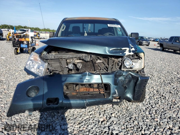 2004 Nissan Titan LE with VIN 1N6AA06AX4N569946, listed as a Copart auction lot 66093335 with Not provided miles and Salvage title. Bid and sale history available at DreamBid. Image 5.