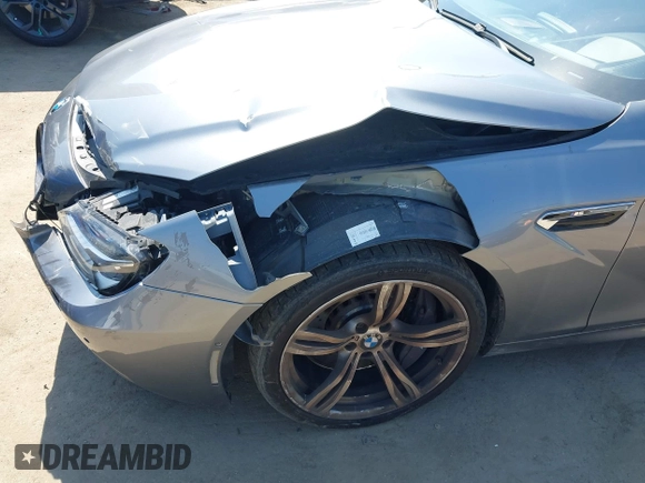 2013 BMW M6 with VIN WBSLX9C51DC968593, listed as a IAAI auction lot 42465979 with 88,010 mi miles and . Bid and sale history available at DreamBid. Image 18.