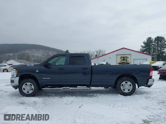 2021 Ram 2500 Tradesman with VIN 3C6UR5HL5MG671238, listed as a IAAI auction lot 41404738 with 60,658 mi miles and . Bid and sale history available at DreamBid. Image 14.