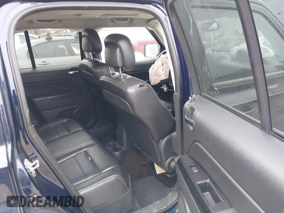 2014 Jeep Patriot Latitude with VIN 1C4NJPFA4ED681811, listed as a IAAI auction lot 41069070 with 143,467 mi miles and . Bid and sale history available at carsss.com. Image 8.