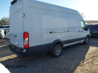 2023 Ford Transit Cargo z VIN 1FTBF4U80PKA47025, wystawiony jako IAAI lot #41715521 z przebiegiem 104 952 mil mil oraz . Historia ofert i sprzedaży dostępna na DreamBid. Obrazek 4.
