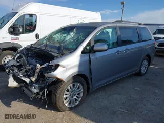 2012 Toyota Sienna XLE AAS with VIN 5TDYK3DC6CS181724, listed as a IAAI auction lot 41848192 with 100,973 mi miles. Bid and sale history available at carsss.com. Image 17.