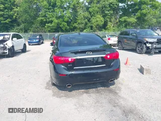 2015 Infiniti Q50 Premium z VIN JN1BV7AR6FM419099, wystawiony jako IAAI lot #42483126 z przebiegiem 100 960 mil mil oraz . Historia ofert i sprzedaży dostępna na DreamBid. Obrazek 17.