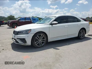 2016 Volkswagen Passat S with VIN 1VWAT7A3XGC032621, listed as a Copart auction lot 63222885 with 128,634 mi miles and Salvage title. Bid and sale history available at DreamBid. Image 1.