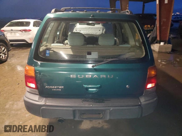 1999 Subaru Forester L with VIN JF1SF6351XH717087, listed as a Copart auction lot 85509274 with 59,695 mi miles and Salvage Title. Bid and sale history available at carsss.com. Image 6.