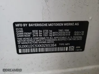 2019 BMW X6 xDrive35i with VIN 5UXKU2C5XK0Z65384, listed as a Copart auction lot 46660415 with 89,984 mi miles and Salvage Title. Bid and sale history available at carsss.com. Image 14.