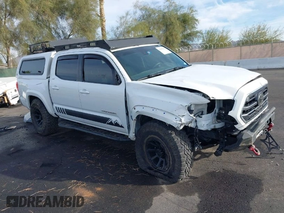 2019 Toyota Tacoma SR z VIN 3TMCZ5AN6KM284101, wystawiony jako IAAI lot #41099466 z przebiegiem 36 119 mil mil oraz . Historia ofert i sprzedaży dostępna na DreamBid. Obrazek 1.