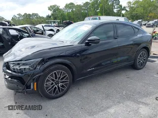 2024 Ford Mustang Mach-E Premium z VIN 3FMTK3R72RMA42779, wystawiony jako IAAI lot #42099121 z przebiegiem 1 791 mil mil oraz . Historia ofert i sprzedaży dostępna na DreamBid. Obrazek 2.