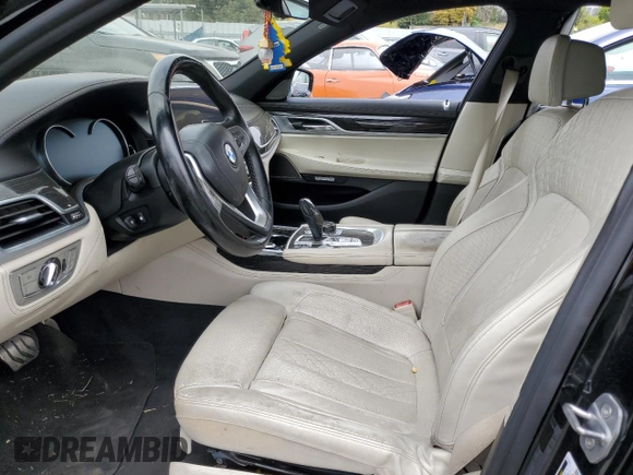 2017 BMW 7 Series 740i with VIN WBA7E2C56HG739456, listed as a Copart auction lot 64728303 with Not Provided miles and . Bid and sale history available at DreamBid. Image 7.