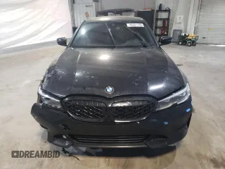 2019 BMW 3 Series 330i xDrive with VIN WBA5R7C57KAJ87310, listed as a Copart auction lot 42261105 with 0 mi miles and Salvage Title. Bid and sale history available at carsss.com. Image 5.
