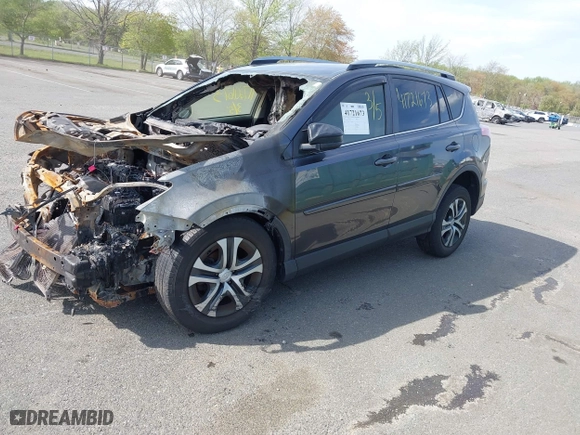 2017 Toyota RAV4 LE with VIN JTMBFREV8HJ171942, listed as a IAAI auction lot 41721673 with 1 mi miles. Bid and sale history available at carsss.com. Image 2.