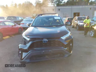 2023 Toyota RAV4 Hybrid XLE with VIN 2T3UWRFV1PW185916, listed as a IAAI auction lot 40877774 with 88,564 mi miles. Bid and sale history available at carsss.com. Image 12.