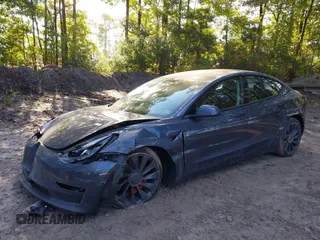 2022 Tesla Model 3 Performance with VIN 5YJ3E1EC7NF329679, listed as a IAAI auction lot 40555901 with 32,552 mi miles and . Bid and sale history available at DreamBid. Image 2.