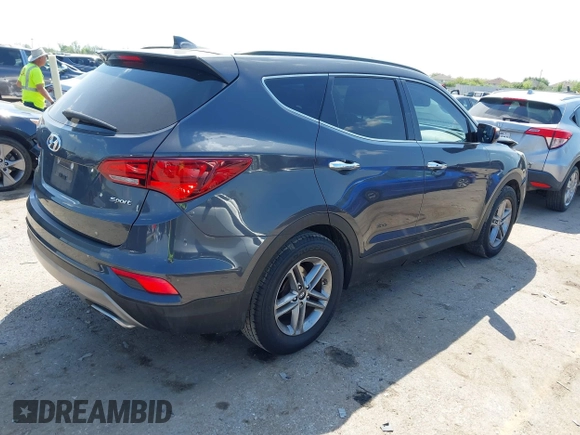 2017 Hyundai Santa Fe 2.4L z VIN 5XYZU3LB4HG462058, wystawiony jako IAAI lot #41861190 z przebiegiem 87 102 mil mil oraz . Historia ofert i sprzedaży dostępna na DreamBid. Obrazek 4.