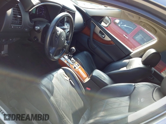 2013 Infiniti FX with VIN JN8CS1MW4DM174765, listed as a IAAI auction lot 42353218 with 109,881 mi miles and . Bid and sale history available at DreamBid. Image 19.