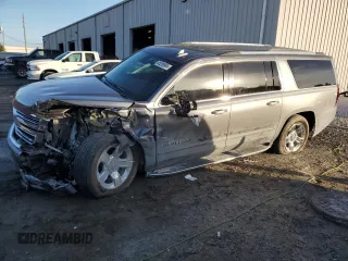 2020 Chevrolet Suburban Premier with VIN 1GNSCJKC5LR163330, listed as a Copart auction lot 85289904 with 83,448 mi miles and Salvage title. Bid and sale history available at DreamBid. Image 1.