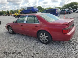 2002 Cadillac Seville Touring STS z VIN 1G6KY54922U288481, wystawiony jako Copart lot #68859394 z przebiegiem 63 612 mil mil oraz Szkody całkowita. Historia ofert i sprzedaży dostępna na DreamBid. Obrazek 2.