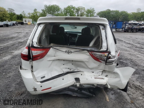2015 Toyota Sienna LE with VIN 5TDJK3DCXFS126604, listed as a Copart auction lot 56987355 with 102,079 mi miles and Salvage title. Bid and sale history available at DreamBid. Image 6.