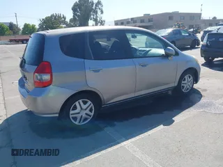 2007 Honda Fit z VIN JHMGD38467S017278, wystawiony jako IAAI lot #42513601 z przebiegiem 107 177 mil mil oraz . Historia ofert i sprzedaży dostępna na DreamBid. Obrazek 4.