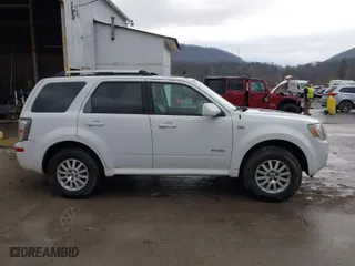 2008 Mercury Mariner Premier with VIN 4M2CU97188KJ29232, listed as a IAAI auction lot 41673352 with 152,727 mi miles. Bid and sale history available at carsss.com. Image 13.