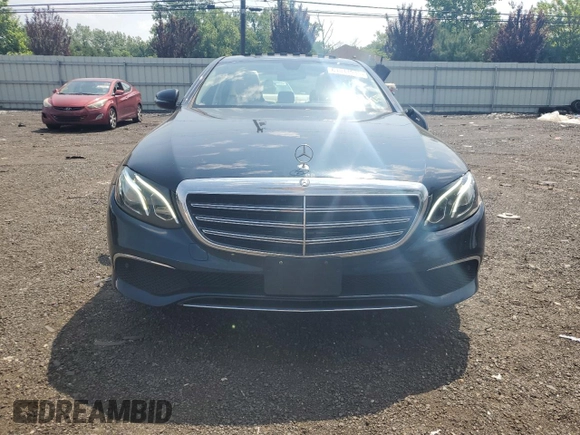 2017 Mercedes-Benz E 300 Luxury with VIN WDDZF4KBXHA185598, listed as a Copart auction lot 61011935 with 59,116 mi miles and Salvage title. Bid and sale history available at DreamBid. Image 5.