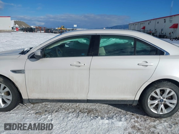 2011 Ford Taurus SEL z VIN 1FAHP2EW2BG143071, wystawiony jako IAAI lot #41538097 z przebiegiem 126 668 mil mil oraz . Historia ofert i sprzedaży dostępna na DreamBid. Obrazek 14.