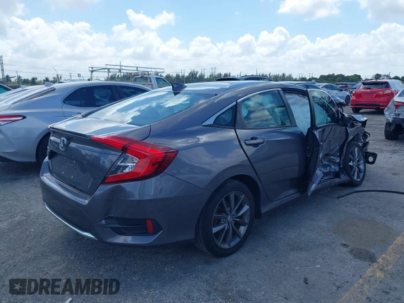 2021 Honda Civic Sedan EX with VIN 19XFC1F34ME001481, listed as a IAAI auction lot 41943440 with 35,851 mi miles. Bid and sale history available at carsss.com. Image 4.