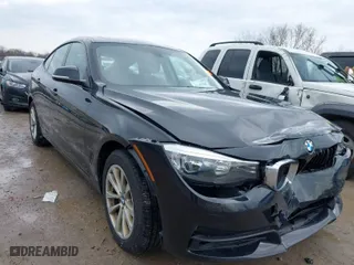 2014 BMW 3 Series Gran Turismo 328i xDrive with VIN WBA3X5C51ED558871, listed as a IAAI auction lot 41940706 with 74,126 mi miles. Bid and sale history available at carsss.com. Image 1.