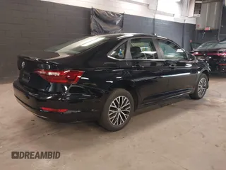 2021 Volkswagen Jetta S with VIN 3VWC57BU6MM086065, listed as a IAAI auction lot 42551694 with 16,472 mi miles and . Bid and sale history available at DreamBid. Image 4.
