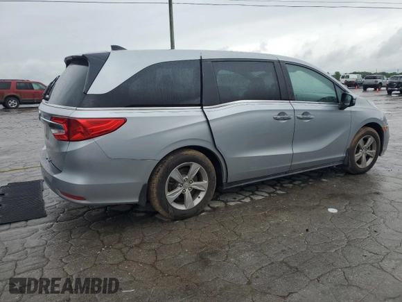 2018 Honda Odyssey EX-L z VIN 5FNRL6H74JB033475, wystawiony jako Copart lot #55736415 z przebiegiem 104 108 mil mil oraz Szkoda całkowita • Salvage title. Historia ofert i sprzedaży dostępna na DreamBid. Obrazek 3.