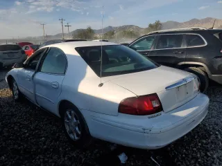 2000 Mercury Sable z VIN 1MEFM53U7YG640279, wystawiony jako Copart lot #70701264 z przebiegiem 118 790 mil mil oraz Szkoda całkowita • Salvage title. Historia ofert i sprzedaży dostępna na DreamBid. Obrazek 2.