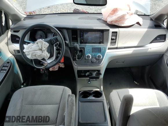 2015 Toyota Sienna LE with VIN 5TDJK3DC8FS104777, listed as a Copart auction lot 63440925 with 195,962 mi miles and Salvage title. Bid and sale history available at DreamBid. Image 8.