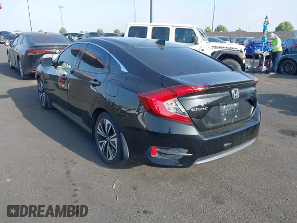 2016 Honda Civic EX-L with VIN 2HGFC1F79GH659164, listed as a IAAI auction lot 42455097 with 166,157 mi miles and . Bid and sale history available at DreamBid. Image 3.