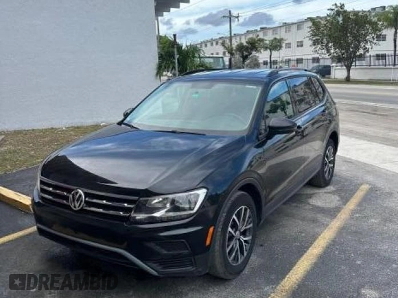 2021 Volkswagen Tiguan S with VIN 3VV1B7AX9MM105997, listed as a Copart auction lot 57079115 with 146,399 mi miles and Clean title. Bid and sale history available at DreamBid. Image 2.