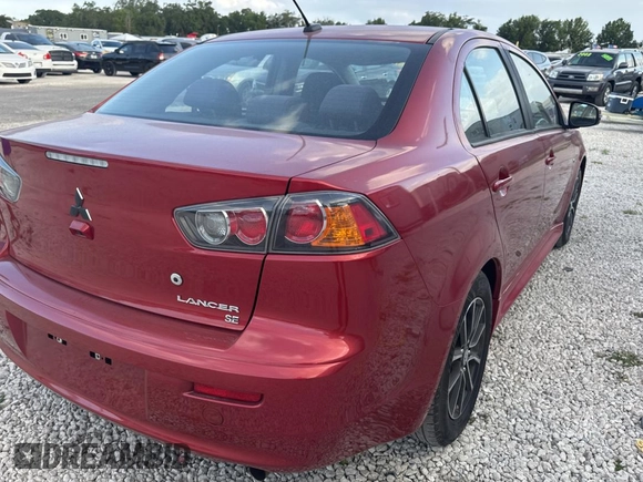2016 Mitsubishi Lancer SE with VIN JA32V2FW5GU013006, listed as a Copart auction lot 55860815 with 122,815 mi miles and Clean Title. Bid and sale history available at carsss.com. Image 4.