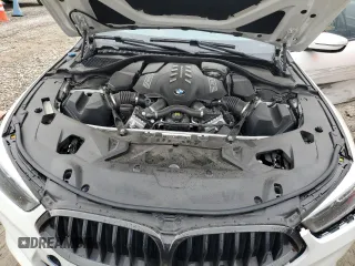 2020 BMW 8 Series M850i with VIN WBAGV8C05LCE00682, listed as a Copart auction lot 77863994 with 22,999 mi miles and Salvage Title. Bid and sale history available at carsss.com. Image 13.