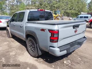 2023 Nissan Frontier PRO-4X with VIN 1N6ED1EKXPN674662, listed as a IAAI auction lot 42001624 with 24,928 mi miles. Bid and sale history available at carsss.com. Image 3.