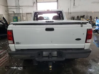 2000 Ford Ranger XLT with VIN 1FTZR15X3YPB99170, listed as a Copart auction lot 87906955 with 146,415 mi miles and Salvage Title. Bid and sale history available at carsss.com. Image 6.