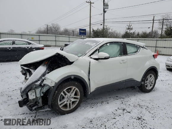 2021 Toyota C-HR LE z VIN NMTKHMBX4MR132912, wystawiony jako Copart lot #41374885 z przebiegiem 41 386 mil mil oraz Szkoda całkowita • Salvage title. Historia ofert i sprzedaży dostępna na DreamBid. Obrazek 1.
