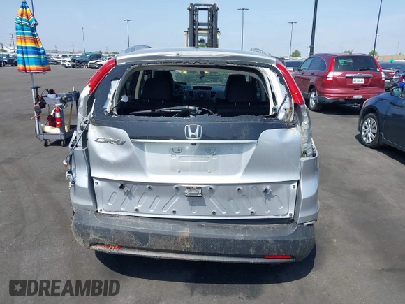 2014 Honda CR-V EX-L with VIN 2HKRM3H75EH563098, listed as a IAAI auction lot 42151583 with 152,882 mi miles and . Bid and sale history available at carsss.com. Image 16.