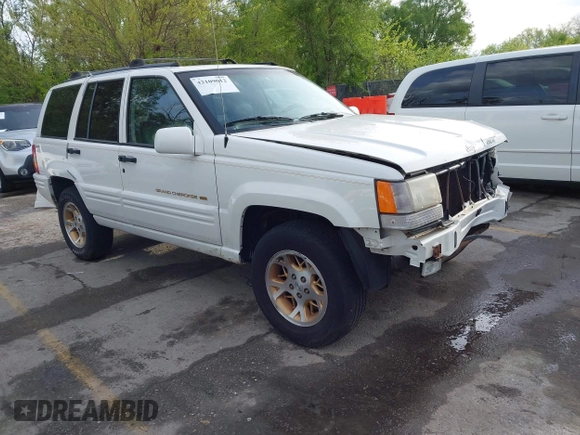 1998 Jeep Grand Cherokee Limited with VIN 1J4GZ78Y2WC164021, listed as a IAAI auction lot 42109012 with 1 mi miles. Bid and sale history available at carsss.com. Image 1.